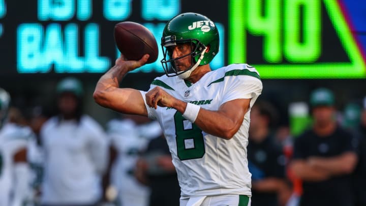 Aug 26, 2023; East Rutherford, New Jersey, USA; New York Jets quarterback Aaron Rodgers (8) throws a pass  against the New York Giants during the first half at MetLife Stadium. Mandatory Credit: Ed Mulholland-USA TODAY Sports