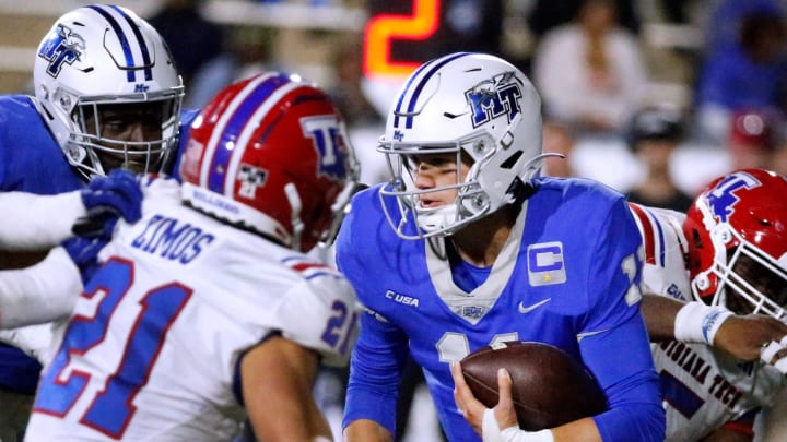 Middle Tennessee quarterback Nicholas Vattiato (11) runs the option during the football game against Louisiana Tech in Floyd Stadium at Middle Tennessee, in Murfreesboro, Tenn. on Tuesday, Oct. 10, 2023.