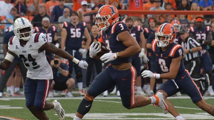 Sep 23, 2023; Champaign, Illinois, USA;  Illinois Fighting Illini running back Kaden Feagin (3) runs the ball against the Florida Atlantic Owls after a game at Memorial Stadium. Mandatory Credit: Ron Johnson-USA TODAY Sports