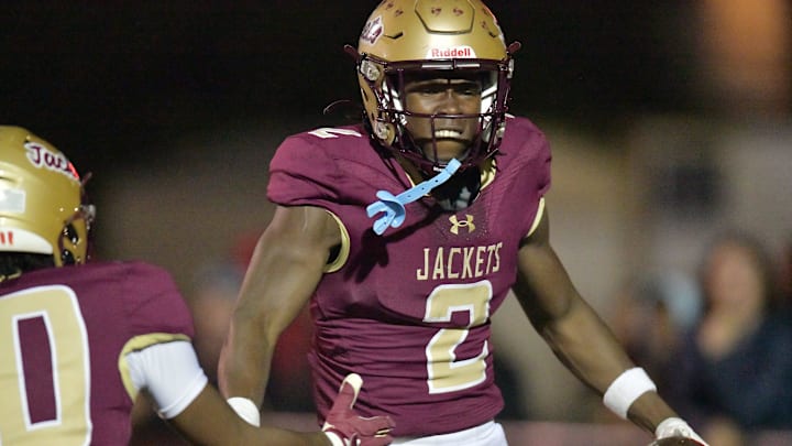 St. Augustine's Carl Jenkins Jr. (2) celebrates his fourth quarter touchdown. The Choctawhatchee Indians traveled to Saint Augustine High School to take on the Yellow Jackets in the FHSAA Region 1-3A High School Football Finals Friday, November 24, 2023. The Yellow Jackets led 21 to 17 at the half and came away with a 35 to 26 victory.