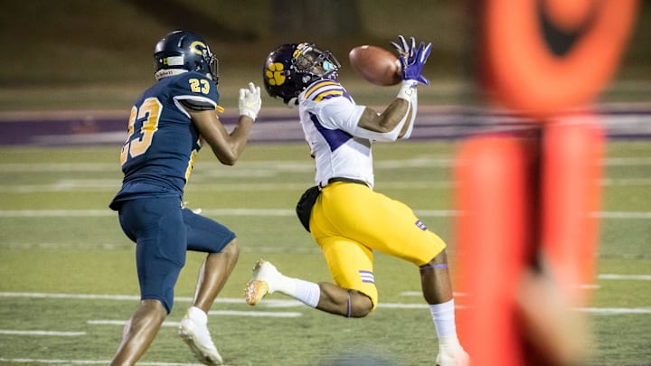An Edna Karr receiver hauls in a pass in the class 4A LHSAA State Football Championship game in 2020. An Edna Karr receiver hauls in a pass in the class 4A LHSAA State Football Championship game in 2020.