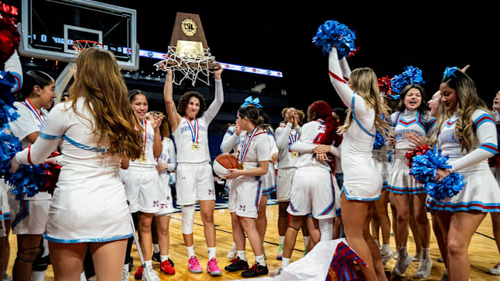 Lubbock Monterey, including guard Aaliyah Chavez (2), center, celebrate the team's 64-35 Texas UIL 5A Division 2 State Championship victory over Liberty Hill at the Alamodome in San Antonio, March 1, 2025.