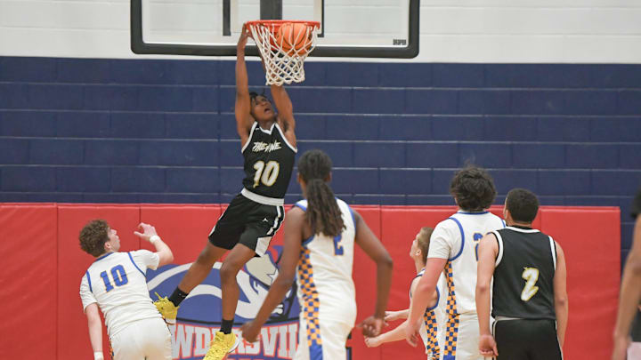 Greer guard Amare Anderson dunks during the second quarter of a Class 4A state boys basketball playoff game in Greenville, S.C., Tuesday, Feb. 25, 2025.
