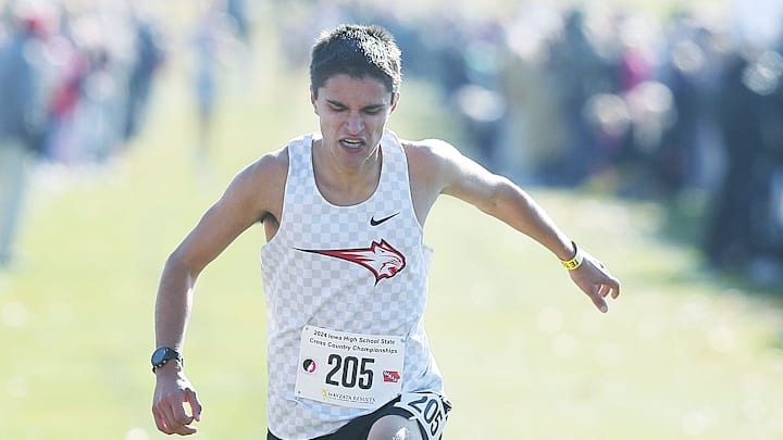 Western Dubuque’s Quentin Nauman finishes his race in the 3A high school boys cross Country at Lakeside Golf Course on Friday, Nov. 1, 2024, in Fort Dodge, Iowa. Western Dubuque’s Quentin Nauman finishes his race in the 3A high school boys cross Country at Lakeside Golf Course on Friday, Nov. 1, 2024, in Fort Dodge, Iowa.
