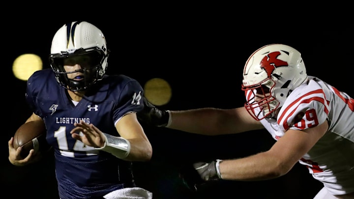 Appleton North High School’s Grant Hardy (14) against Kimberly High School during their football game in Appleton, Wisconsin on Friday, October 17, 2025. Kimberly defeated Appleton North 28-10.
Wm. Glasheen USA TODAY NETWORK-Wisconsin Appleton North High School’s Grant Hardy (14) against Kimberly High School during their football game in Appleton, Wisconsin on Friday, October 17, 2025. Kimberly defeated Appleton North 28-10.
Wm. Glasheen USA TODAY NETWORK-Wisconsin