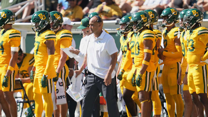 Oct 4, 2025; Waco, Texas, USA; Baylor Bears head coach Dave Aranda watches game play from the sideline against the Kansas State Wildcats during the first half at McLane Stadium. Mandatory Credit: Chris Jones-Imagn Images