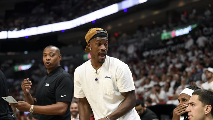 Apr 29, 2024; Miami, Florida, USA; Miami Heat forward Jimmy Butler (22) comments on the game from the bench during the first quarter of game four of the first round for the 2024 NBA playoffs, against the Boston Celtics, at Kaseya Center. Mandatory Credit: Michael Laughlin-USA TODAY Sports