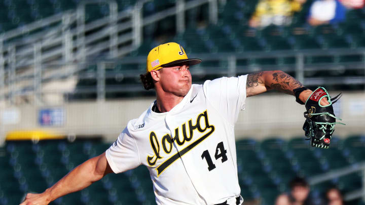 Brody Brecht (14) of Iowa throws strikes as the Florida International University Panthers play the Iowa Hawks in a three-game series at Principal Park in Des Moines on Thursday, May 16, 2024.