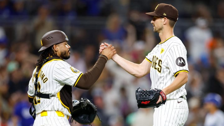 Jul 31, 2024; San Diego, California, USA; San Diego Padres catcher Luis Campusano (12) celebrates with relief pitcher Bryan Hoeing (78) after the final out of the game against the Los Angeles Dodgers at Petco Park. Mandatory Credit: David Frerker-USA TODAY Sports