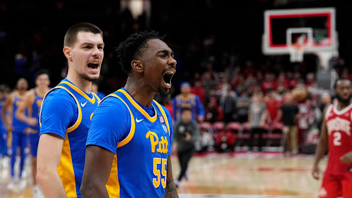 Pittsburgh Panthers forward Zack Austin (55) celebrates hitting the game winning three pointer in overtime of the NCAA men's basketball game against the Ohio State Buckeyes at Value City Arena in Columbus on Friday, Nov. 29, 2024. Ohio State lost 91-90 on a last second shot. Pittsburgh Panthers forward Zack Austin (55) celebrates hitting the game winning three pointer in overtime of the NCAA men's basketball game against the Ohio State Buckeyes at Value City Arena in Columbus on Friday, Nov. 29, 2024. Ohio State lost 91-90 on a last second shot.
