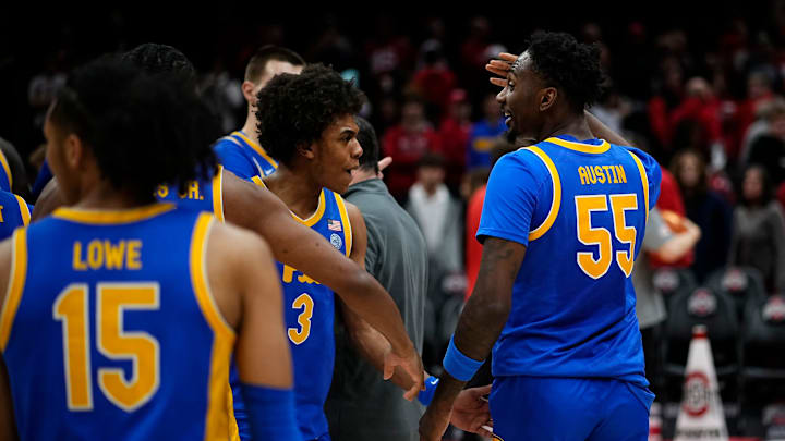 Pittsburgh Panthers guard Brandin Cummings (3) celebrates with Pittsburgh Panthers forward Zack Austin (55) following the NCAA men's basketball game against the Ohio State Buckeyes at Value City Arena in Columbus on Friday, Nov. 29, 2024. Austin hit the game-winning three pointer to give the Panthers a 91-90 win. Pittsburgh Panthers guard Brandin Cummings (3) celebrates with Pittsburgh Panthers forward Zack Austin (55) following the NCAA men's basketball game against the Ohio State Buckeyes at Value City Arena in Columbus on Friday, Nov. 29, 2024. Austin hit the game-winning three pointer to give the Panthers a 91-90 win.