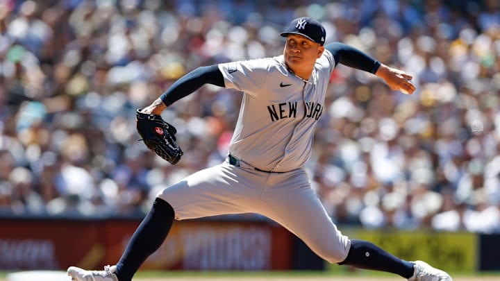 May 26, 2024; San Diego, California, USA; New York Yankees relief pitcher Victor Gonzalez (47) throws a pitch during the sixth inning against the San Diego Padres at Petco Park. Mandatory Credit: David Frerker-Imagn Images