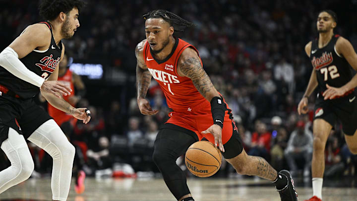 Apr 12, 2024; Portland, Oregon, USA; Houston Rockets forward Cam Whitmore (7) drives to the basket during the first half against Portland Trail Blazers forward Justin Minaya (24) at Moda Center. Mandatory Credit: Troy Wayrynen-Imagn Images