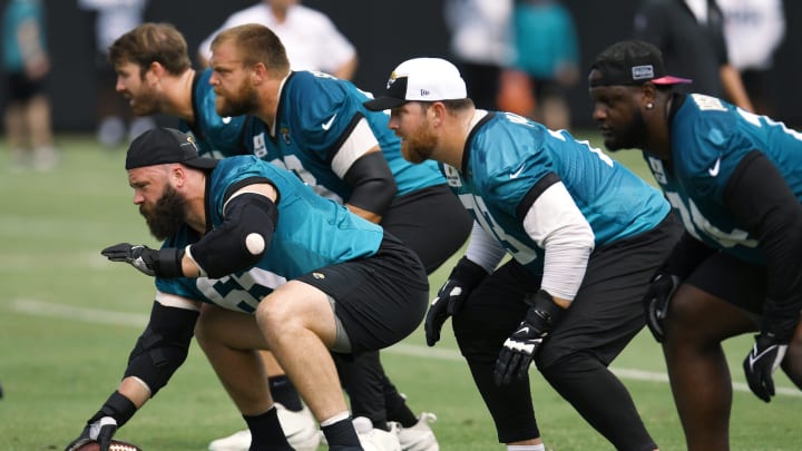 Jacksonville Jaguars center Mitch Morse (65) lines up during the organized team activity session Monday, June 3, 2024 at EverBank StadiumÕs Miller Electric Center in Jacksonville, Fla. [Bob Self/Florida Times-Union]