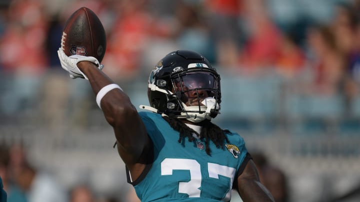 Jacksonville Jaguars cornerback Tre Flowers (37) throws the ball to fans in the stands as he warmed up ahead of the start of Saturday's game against the Chiefs. The Jaguars led 20 to 10 at the end of the first half. The Jacksonville Jaguars hosted the Kansas City Chiefs in the Jaguars first preseason game of the season Saturday, August10, 2024 at EverBank Stadium in Jacksonville, Fla. [Bob Self/Florida Times-Union]