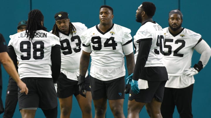 Jacksonville Jaguars defensive tackle Jordan Jefferson (98), defensive end Tyler Lacy (93), defensive tackle Maason Smith (94), defensive end Esezi Otomewo (90) and defensive tackle DaVon Hamilton (52) line up for drills. The Jacksonville Jaguars let most of the veterans off from participating in Monday's mandatory minicamp session held in the air conditioned enclosed field at EverBank Stadium's Miller Electric Center in Jacksonville, Fla. June 10, 2024.