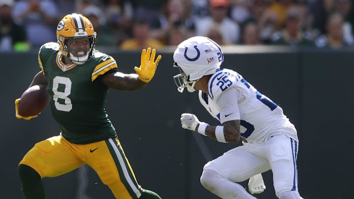 Green Bay Packers running back Josh Jacobs (8) against Indianapolis Colts safety Rodney Thomas II (25) at Lambeau Field on Sunday.