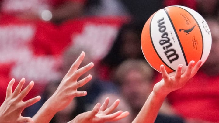 The Indiana Fever and the Atlanta Dream fight for the ball Tuesday, Sept. 16, 2025, during Game 2 of a WNBA playoff matchup between the Indiana Fever and the Atlanta Dream at Gainbridge Fieldhouse in Indianapolis.