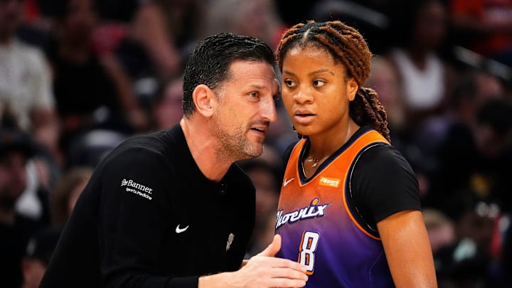 Phoenix Mercury head coach Nate Tibbetts talks to guard Monique Akoa Makani (8) against the New York Liberty in the first half during Game Three of the 2025 WNBA Playoffs first round at PHX Arena on Sept. 19, 2025, in Phoenix.