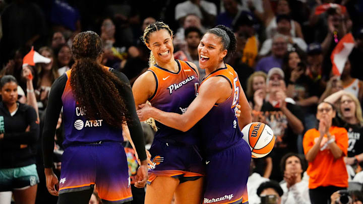 Phoenix Mercury guard Kahleah Copper (2), forward Satou Sabally (0) and forward Alyssa Thomas (25) celebrate their win over the New York Liberty 79-73 to win the series during Game Three of the 2025 WNBA Playoffs first round at PHX Arena on Sept. 19, 2025, in Phoenix. Phoenix Mercury guard Kahleah Copper (2), forward Satou Sabally (0) and forward Alyssa Thomas (25) celebrate their win over the New York Liberty 79-73 to win the series during Game Three of the 2025 WNBA Playoffs first round at PHX Arena on Sept. 19, 2025, in Phoenix.