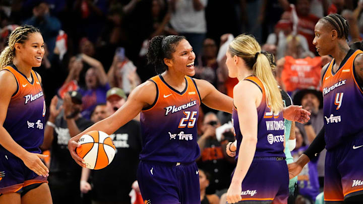 Phoenix Mercury forward Alyssa Thomas (25) celebrates with her teammates as they defeat the New York Liberty 79-73 to win the series during Game Three of the 2025 WNBA Playoffs first round at PHX Arena on Sept. 19, 2025, in Phoenix.