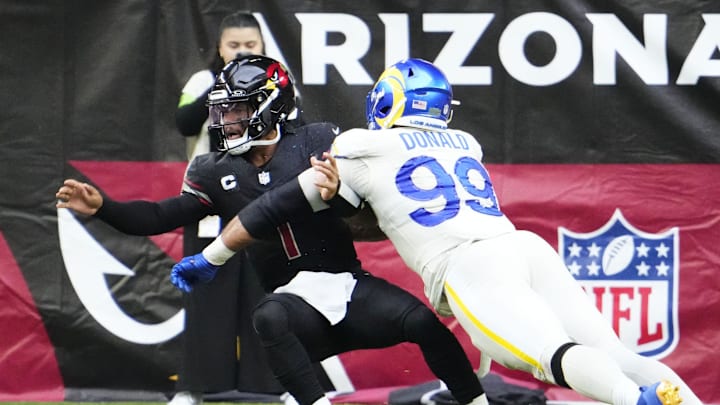 Arizona Cardinals quarterback Kyler Murray (1) is tackled by Los Angeles Rams defensive tackle Aaron Donald (99) in the second half at State Farm Stadium in Glendale on Nov. 26, 2023. Arizona Cardinals quarterback Kyler Murray (1) is tackled by Los Angeles Rams defensive tackle Aaron Donald (99) in the second half at State Farm Stadium in Glendale on Nov. 26, 2023.