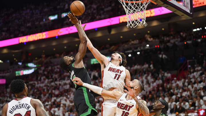 Apr 29, 2024; Miami, Florida, USA; Boston Celtics guard Jaylen Brown (7) takes a shot over Miami Heat rookie Jaime Jaquez