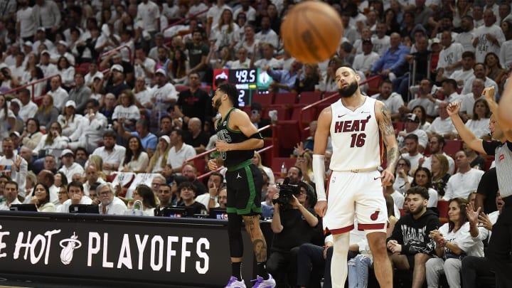Apr 29, 2024; Miami, Florida, USA; Miami Heat forward Caleb Martin (16) reacts to a 3-point basket against the Boston Celtics - Michael Laughlin/USA TODAY Sports