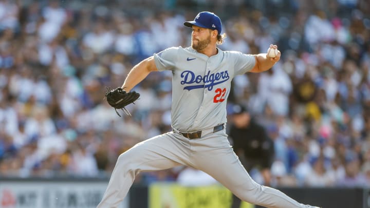 Jul 31, 2024; San Diego, California, USA; Los Angeles Dodgers starting pitcher Clayton Kershaw (22) pitches during the first inning against the San Diego Padres at Petco Park. Mandatory Credit: David Frerker-USA TODAY Sports