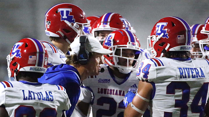 Louisiana Tech head football coach Sonny Cumbie talks with his players during a break in the game against Middle Tennessee in Floyd Stadium at Middle Tennessee, in Murfreesboro, Tenn. on Tuesday, Oct. 10, 2023.