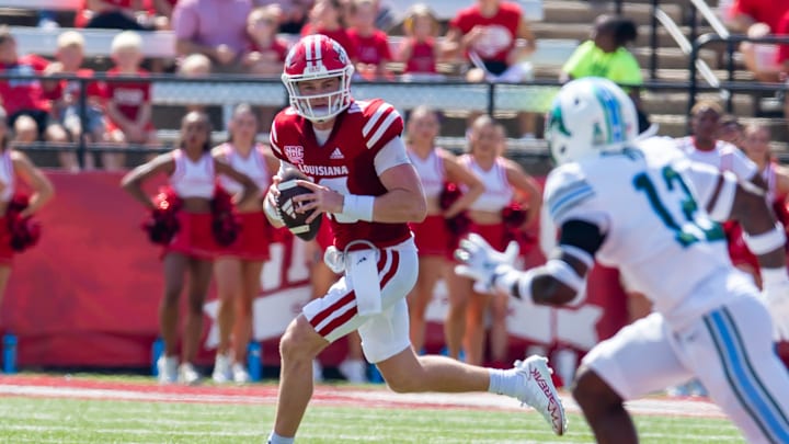 Cajuns quarterback Ben Wooldridge 10 runs the ball as the Louisiana Ragin Cajuns take on Tulane atbCajun Field. Saturday, Sept. 21, 2024.