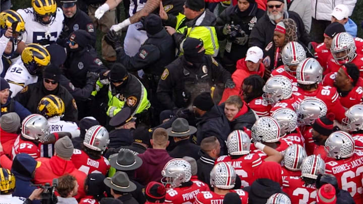 Police officers that used pepper spray to control an on-field brawl following Michigan's upset of Ohio State in November were cleared of wrongdoing.