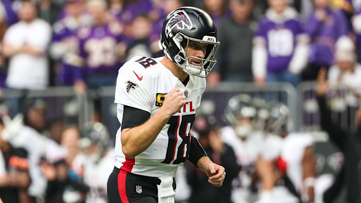 Dec 8, 2024; Minneapolis, Minnesota, USA; Atlanta Falcons quarterback Kirk Cousins (18) celebrates running back Tyler Allgeier's (25) touchdown against the Minnesota Vikings during the first quarter at U.S. Bank Stadium. Mandatory Credit: Matt Krohn-Imagn Images Dec 8, 2024; Minneapolis, Minnesota, USA; Atlanta Falcons quarterback Kirk Cousins (18) celebrates running back Tyler Allgeier's (25) touchdown against the Minnesota Vikings during the first quarter at U.S. Bank Stadium. Mandatory Credit: Matt Krohn-Imagn Images