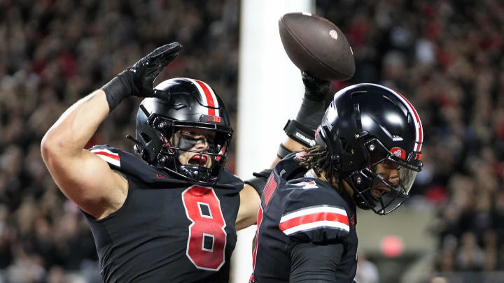 Sep 24, 2022; Columbus, Ohio, USA; Ohio State Buckeyes tight end Cade Stover (8) celebrate his touchdown catch with quarterback C.J. Stroud (7) in the first quarter of the NCAA football game between Ohio State Buckeyes and Wisconsin Badgers at Ohio Stadium. Mandatory Credit: Kyle Robertson/Columbus Dispatch