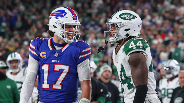 Buffalo Bills quarterback Josh Allen yells at New York Jets linebacker Jamien Sherwood after throwing a touchdown pass Buffalo Bills quarterback Josh Allen yells at New York Jets linebacker Jamien Sherwood after throwing a touchdown pass