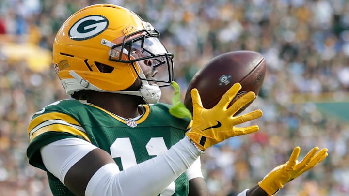 Green Bay Packers wide receiver Jayden Reed (11) catches a second quarter touchdown pass against the Detroit Lions on Sunday, September 7, 2025, at Lambeau Field in Green Bay, Wis. Wm. 