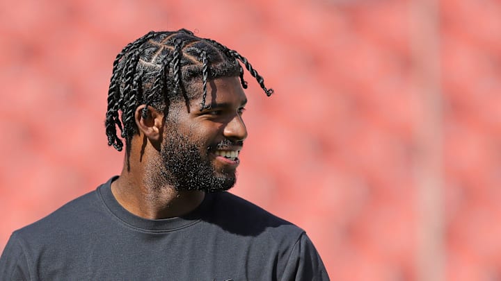 Cleveland Browns quarterback Shedeur Sanders is all smiles as he warms up before an NFL football game at Huntington Bank Field, Sept. 21, 2025, in Cleveland, Ohio. Cleveland Browns quarterback Shedeur Sanders is all smiles as he warms up before an NFL football game at Huntington Bank Field, Sept. 21, 2025, in Cleveland, Ohio.