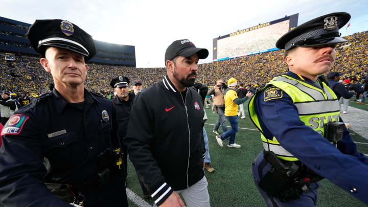 Nov 25, 2023; Ann Arbor, Michigan, USA; Ohio State Buckeyes head coach Ryan Day leaves the field following the NCAA football game against the Michigan Wolverines at Michigan Stadium. Ohio State lost 30-24. Mandatory Credit: Adam Cairns-USA TODAY Sports