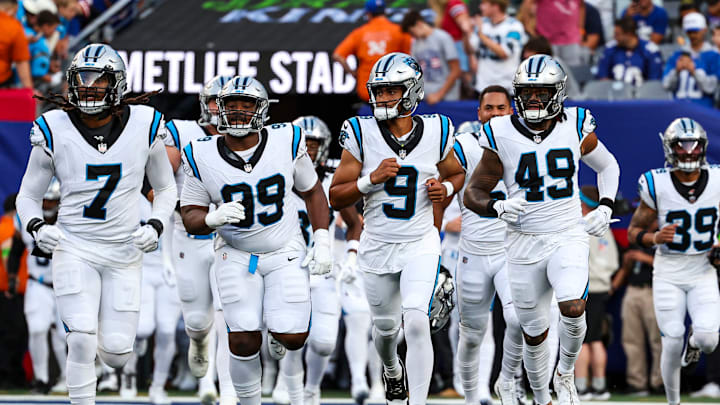 EAST RUTHERFORD, NJ - AUGUST 18: The Carolina Panthers run out onto the field against the New York Giants prior to the game at MetLife Stadium on Friday, August 18, 2023, in East Rutherford, New Jersey.