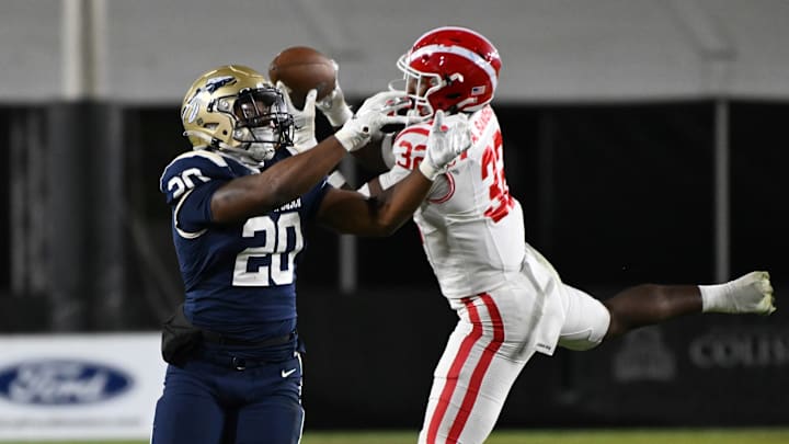 Mater Dei linebacker Abduall Sanders Jr., then a junior, intercepts a pass against St. John Bosco in the 2023 CIF Southern Section Division 1 final at the LA Memorial Coliseum. Mater Dei linebacker Abduall Sanders Jr., then a junior, intercepts a pass against St. John Bosco in the 2023 CIF Southern Section Division 1 final at the LA Memorial Coliseum.