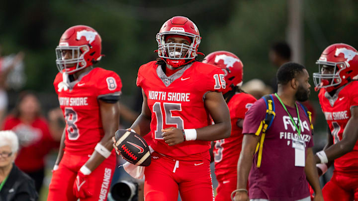 North Shore quarterback Kaleb Bailey following his touchdown run. North Shore quarterback Kaleb Bailey following his touchdown run.