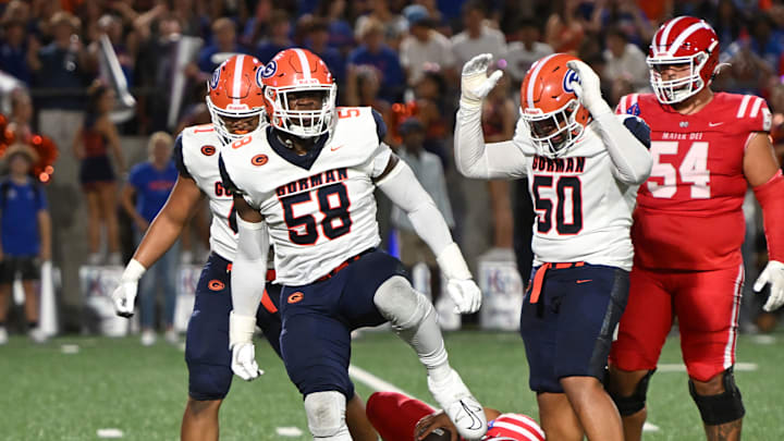 Bishop Gorman defensive tackle James Carrington celebrates after sacking Mater Dei quarterback Ashton Beierly.