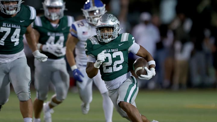 Derrick Blanche Jr. (22) finished with 12 carries, 182 yards rushing, including a 62-yard touchdown jaunt to finish off the scoring. De La Salle finished with 332 yards rushing and 408 overall in a 39-10 win over Serra on Sept. 6, 2024. For the first time in program history, the team traveled overseas on Oct. 3 and will play NFL Academy Tuesday in London. 