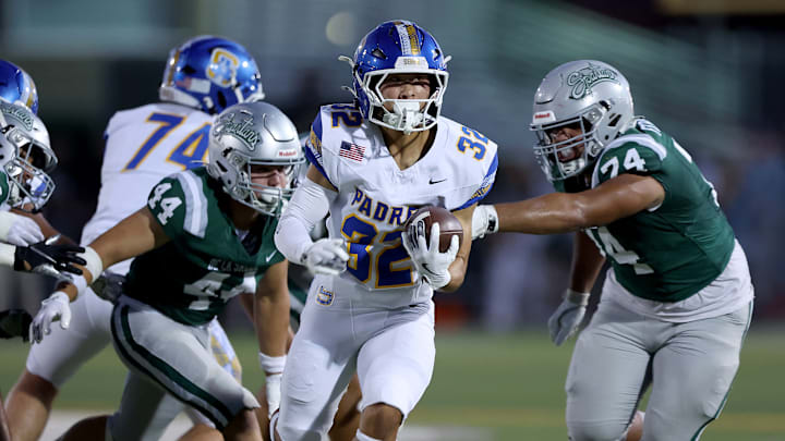 Serra senior running back Chris Yoon races through a big hole during Friday's 39-10 loss at De La Salle