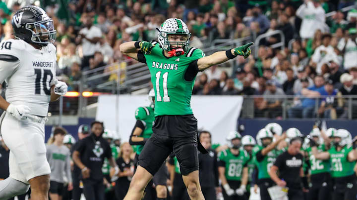 Receiver Brock Boyd of Southlake Carroll signals first down after making a catch during the Texas 6A Division 2 state title game at AT&T Stadium.
