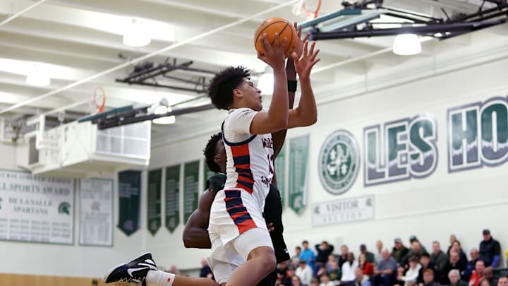 Guard Gavin Sykes of Modesto Christian soars to the basket against St. Joseph in the 27th MLK Classic at De La Salle High School. Modesto Christian is the No. 1 seed in the SJS D1 playoffs. 