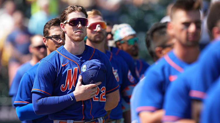 Mar 1, 2023; Jupiter, Florida, USA; New York Mets third baseman Brett Baty (22) stands for the