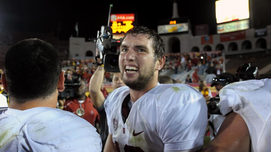 Andrew Luck smiles after an overtime win for the Stanford Cardinal against the USC Trojans.
