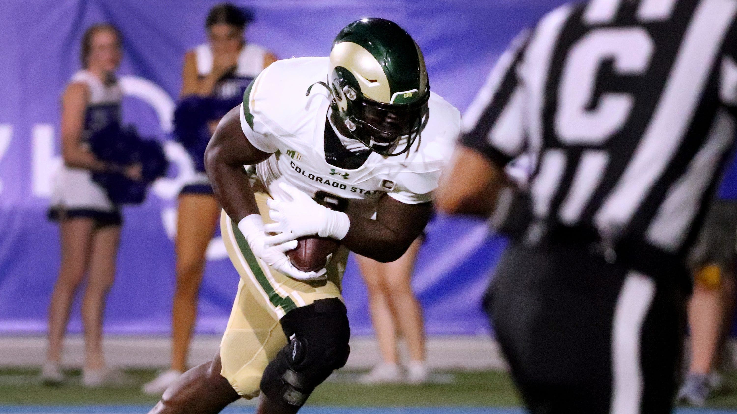 Colorado State defensive lineman Mohamed Kamara (8) grabs a fumbles and runs the ball into the end zone.