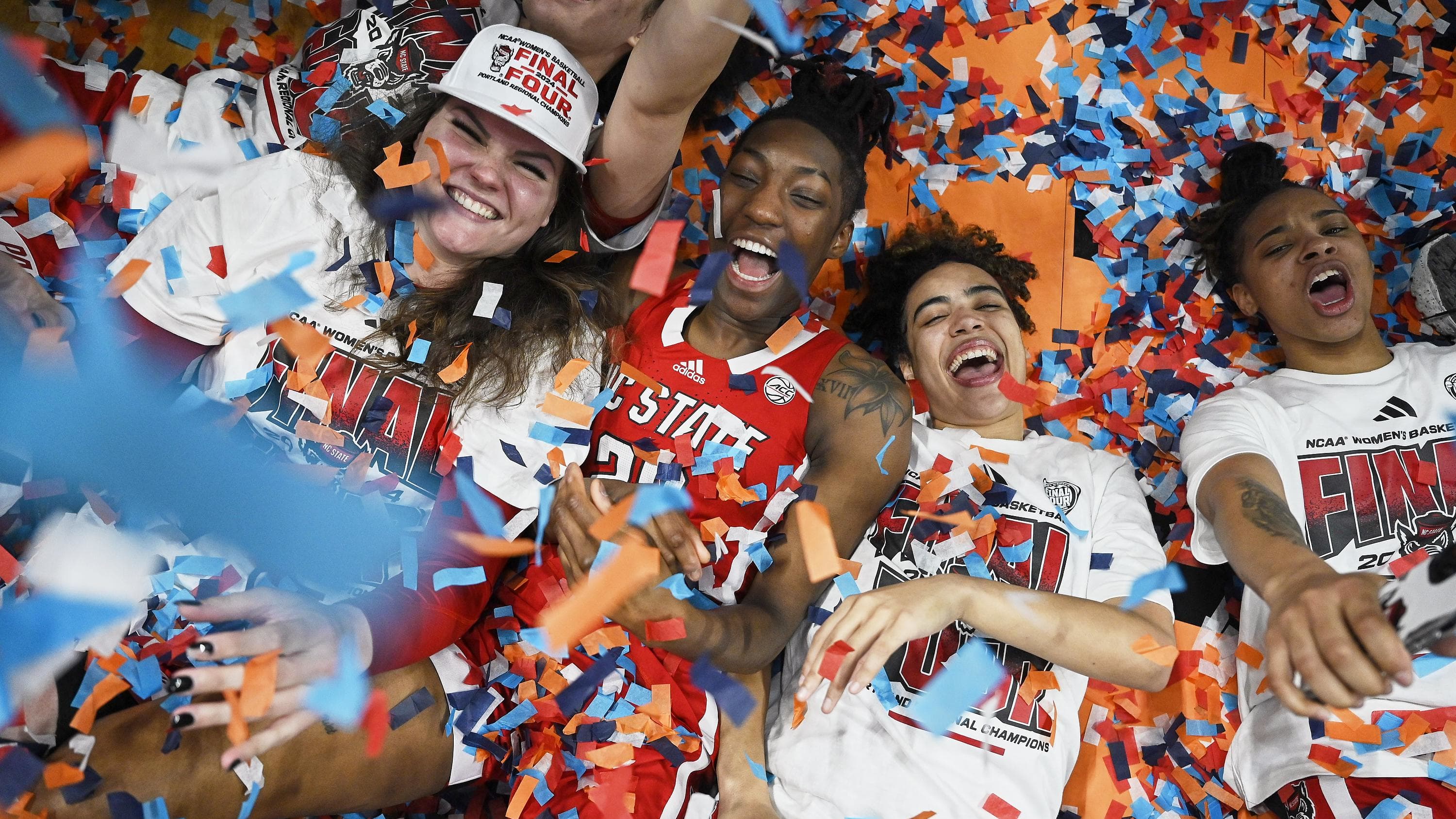 North Carolina State Wolfpack women's basketball players celebrate their Final Four appearance.